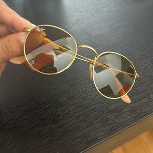 Gold and light brown Ray Bans